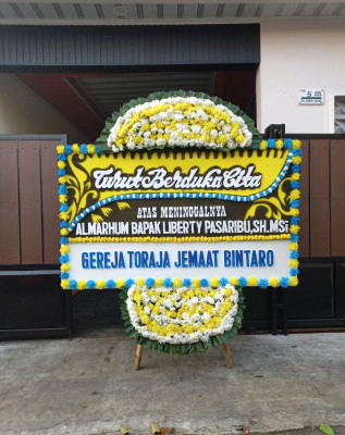 Papan Bunga Duka di Torere